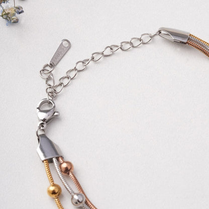 Triple Tone Layered Bead Bracelet – Gold, Rose Gold & Silver Finish