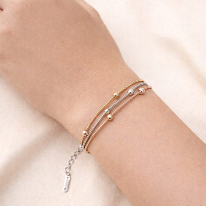 Triple Tone Layered Bead Bracelet – Gold, Rose Gold & Silver Finish