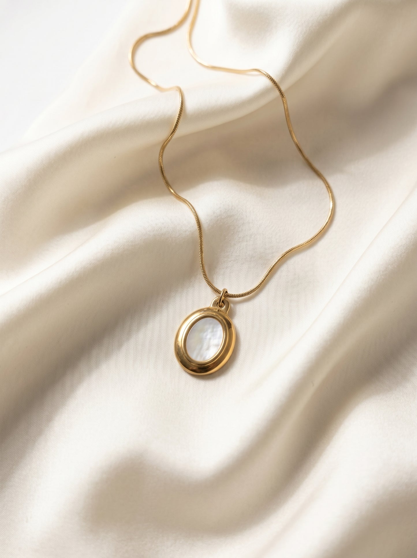 Golden Pearl Oval Pendant Necklace