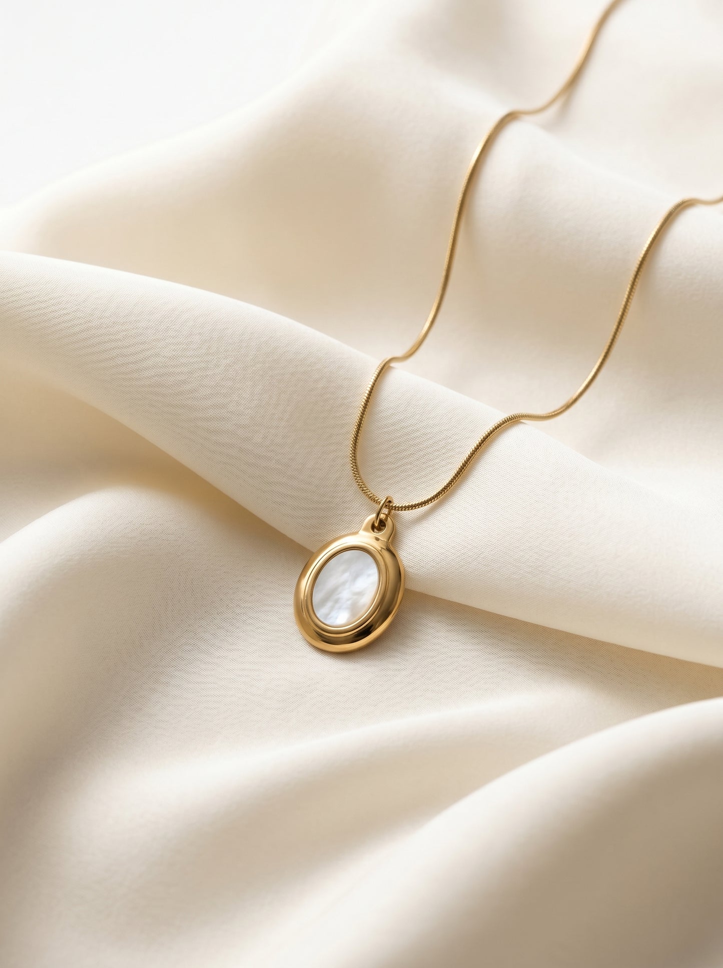 Golden Pearl Oval Pendant Necklace